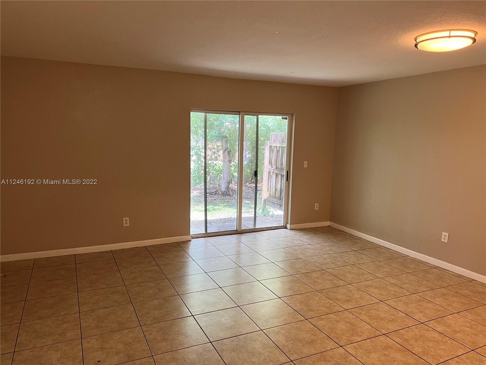 3837 Northwest 76th Way Davie, FL 33024 - Photo 20 of 34 a view of an empty room with a window