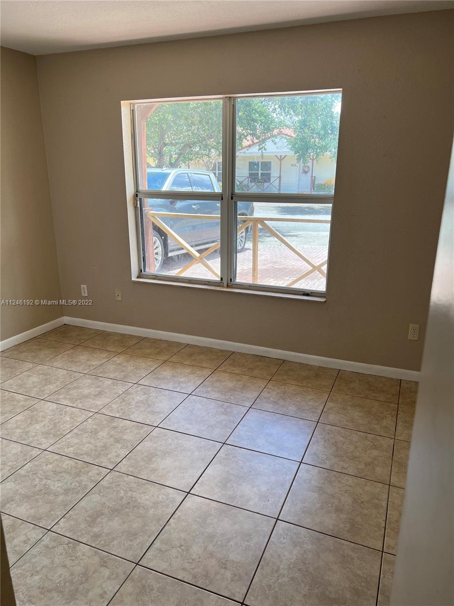 3837 Northwest 76th Way Davie, FL 33024 - Photo 24 of 34 an empty room with a window