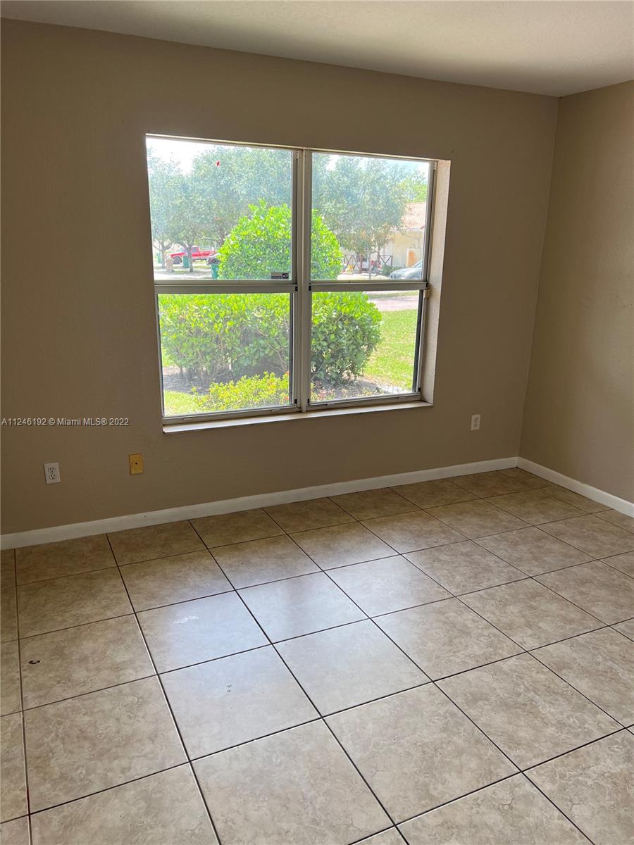 3837 Northwest 76th Way Davie, FL 33024 - Photo 25 of 34 a view of an empty room with a window