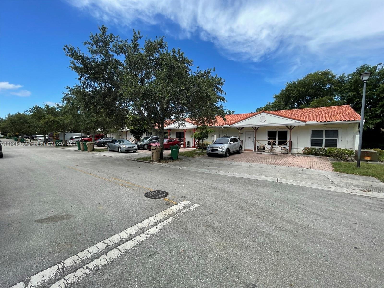3837 Northwest 76th Way Davie, FL 33024 - Photo 29 of 34 a view of street with parked cars