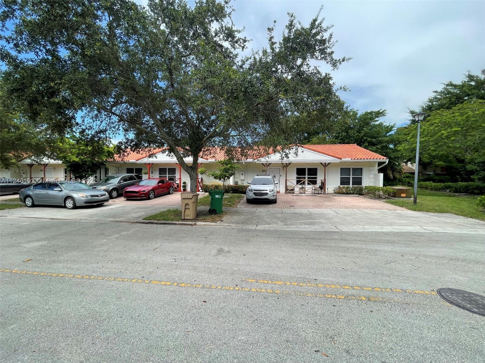 3837 Northwest 76th Way Davie, FL 33024 - Photo 31 of 34 a childrens park with trees and cars