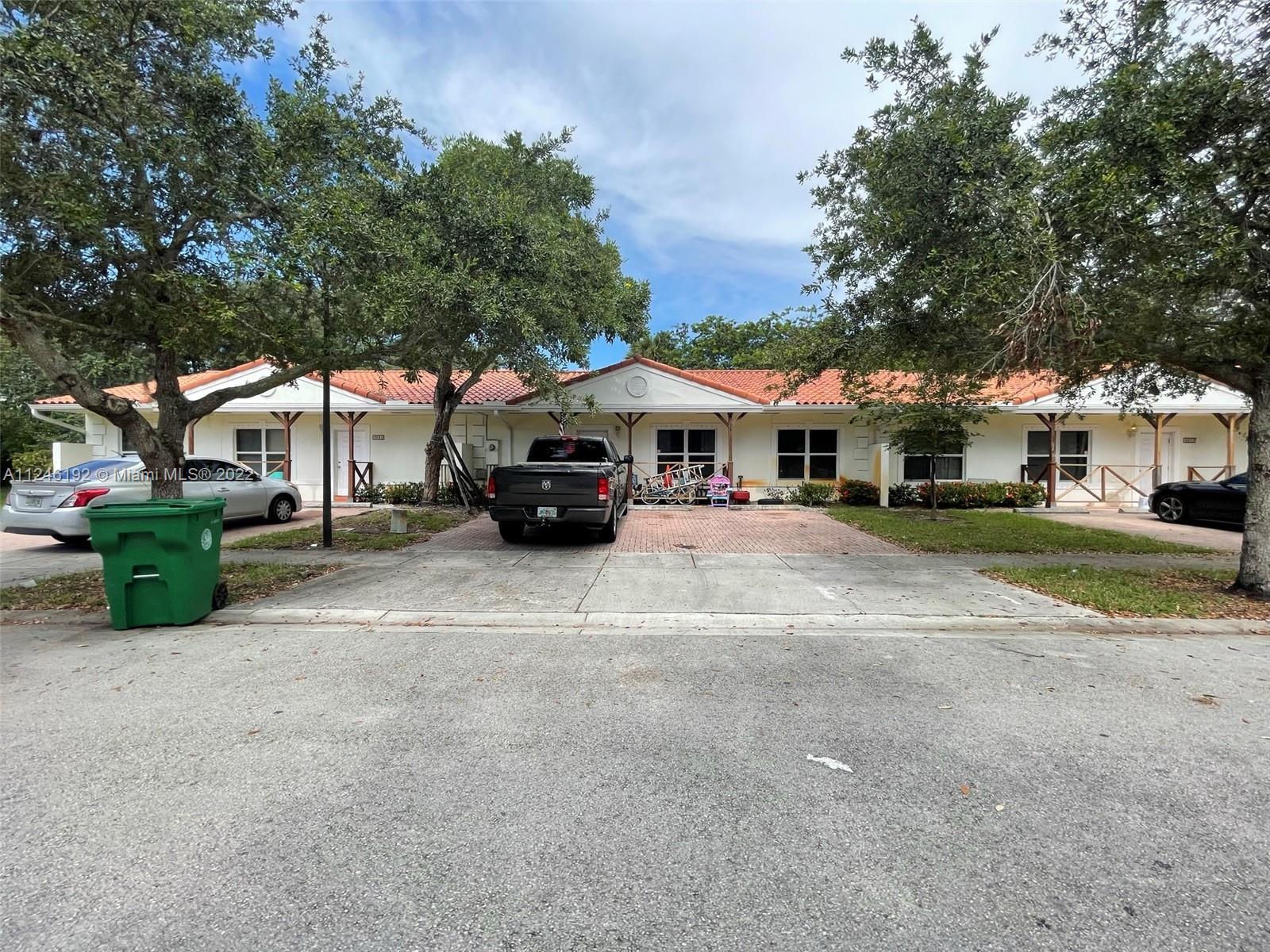 3837 Northwest 76th Way Davie, FL 33024 - Photo 33 of 34 a view of street with parked cars