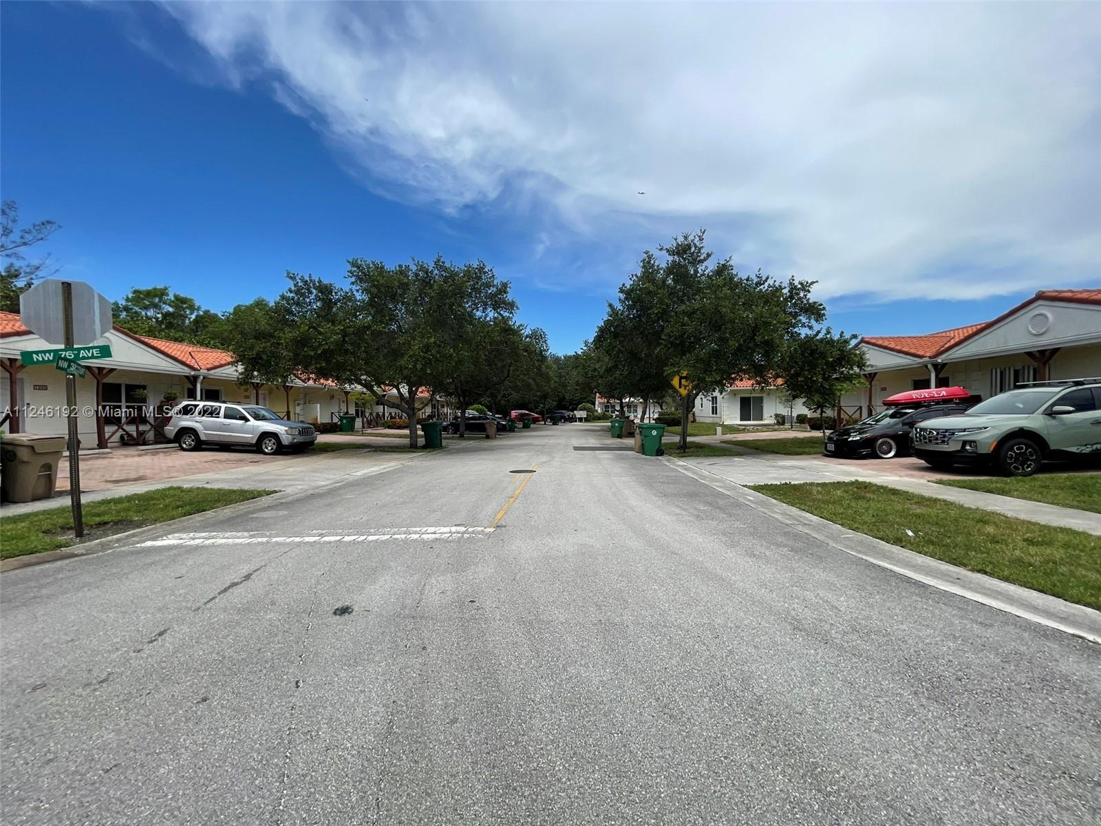 3837 Northwest 76th Way Davie, FL 33024 - Photo 34 of 34 a view of street with parked cars