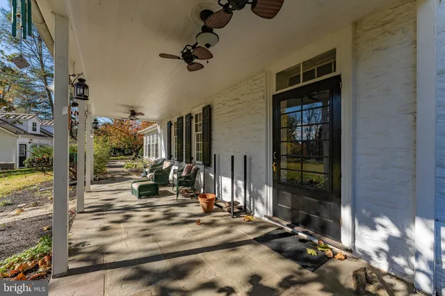 a kitchen with stainless steel appliances granite countertop a lot of counter space and wooden floors