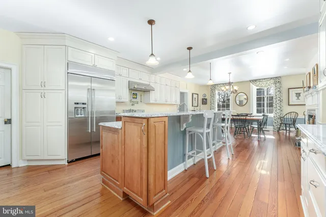 a bedroom with a bed and a mirror