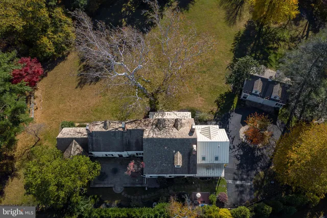 an aerial view of residential house with outdoor space