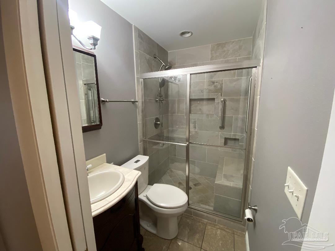 3224 Highway 4 Jay, FL 32565 - Photo 17 of 38 a white toilet sitting next to a bathroom sink