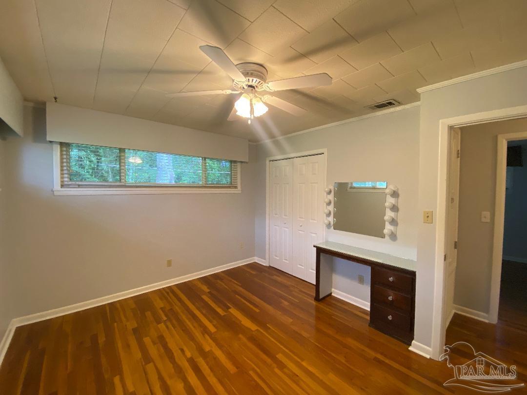 3224 Highway 4 Jay, FL 32565 - Photo 23 of 38 a view of empty room with wooden floor and fan