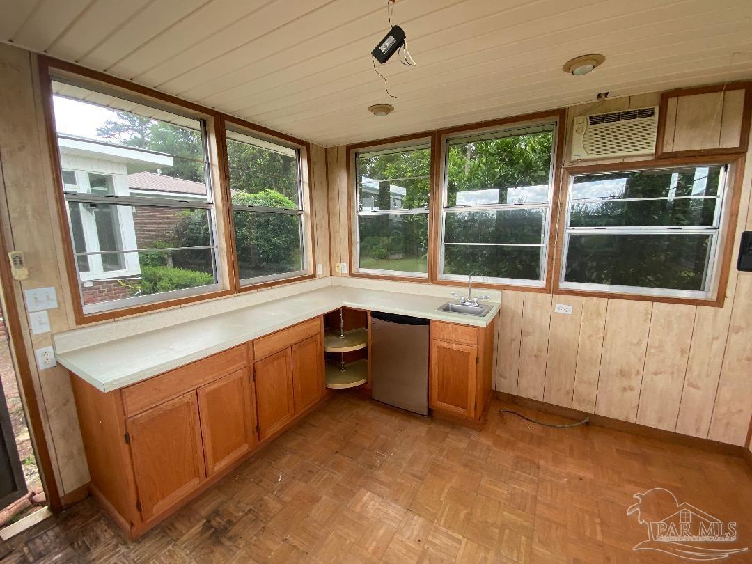 3224 Highway 4 Jay, FL 32565 - Photo 27 of 38 a large white kitchen with granite countertop a large window and a sink