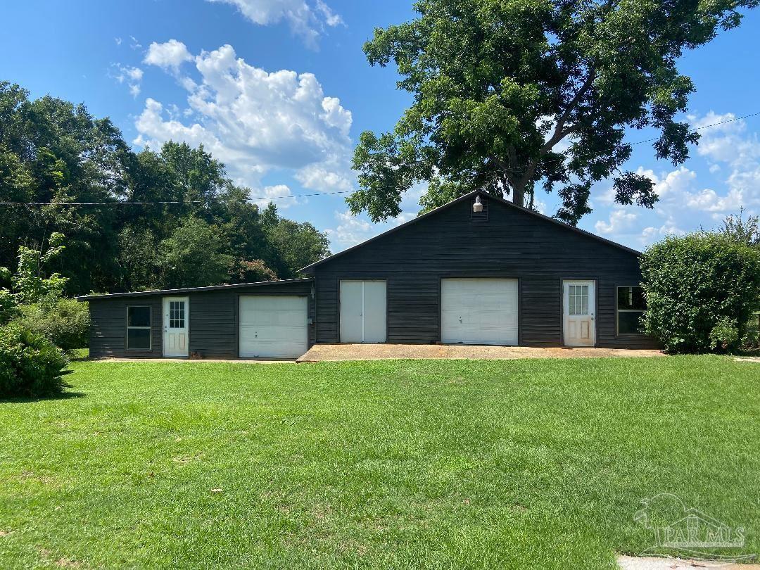 3224 Highway 4 Jay, FL 32565 - Photo 31 of 38 a house that has a tree in front of it