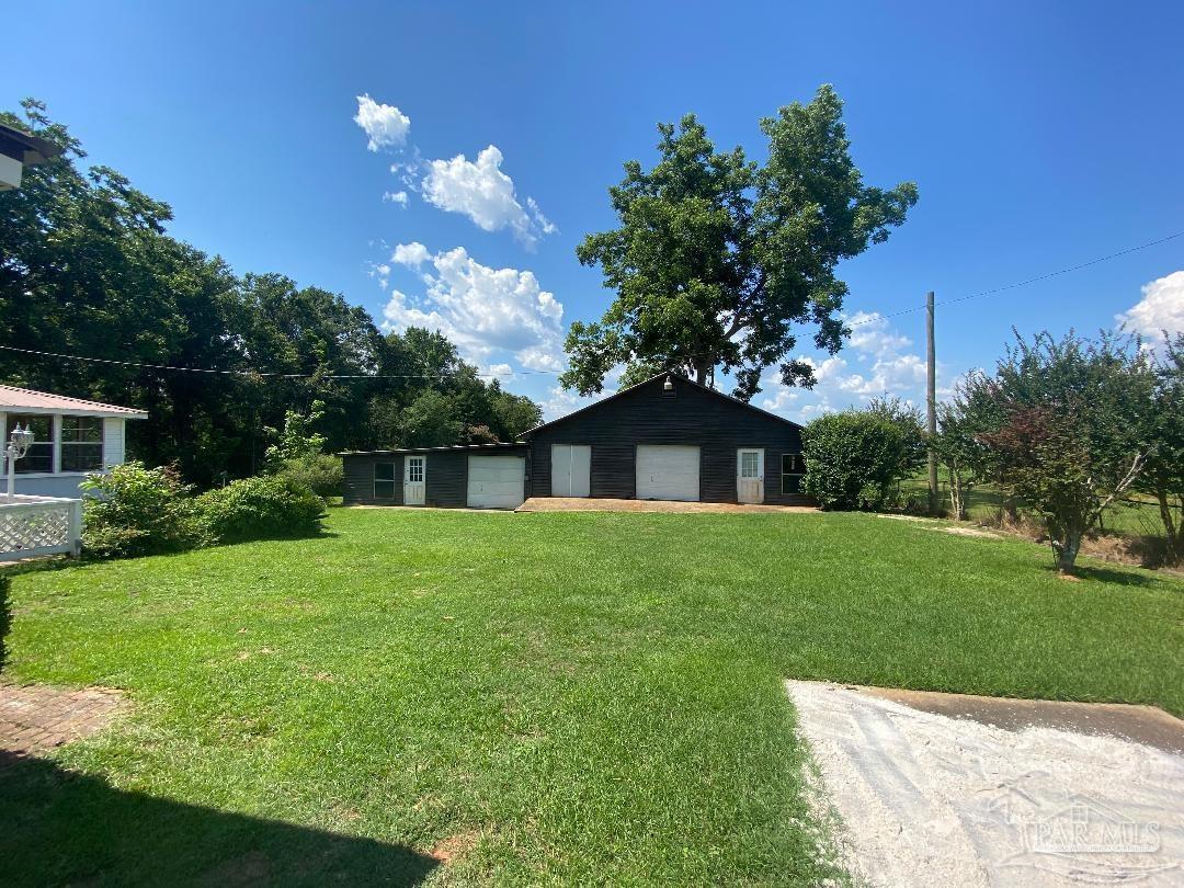 3224 Highway 4 Jay, FL 32565 - Photo 6 of 38 a view of a house with a yard