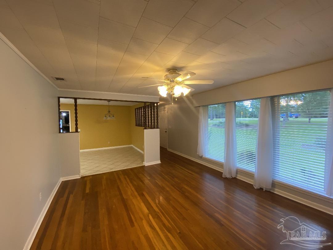 3224 Highway 4 Jay, FL 32565 - Photo 9 of 38 a view of livingroom with kitchen and hardwood floor