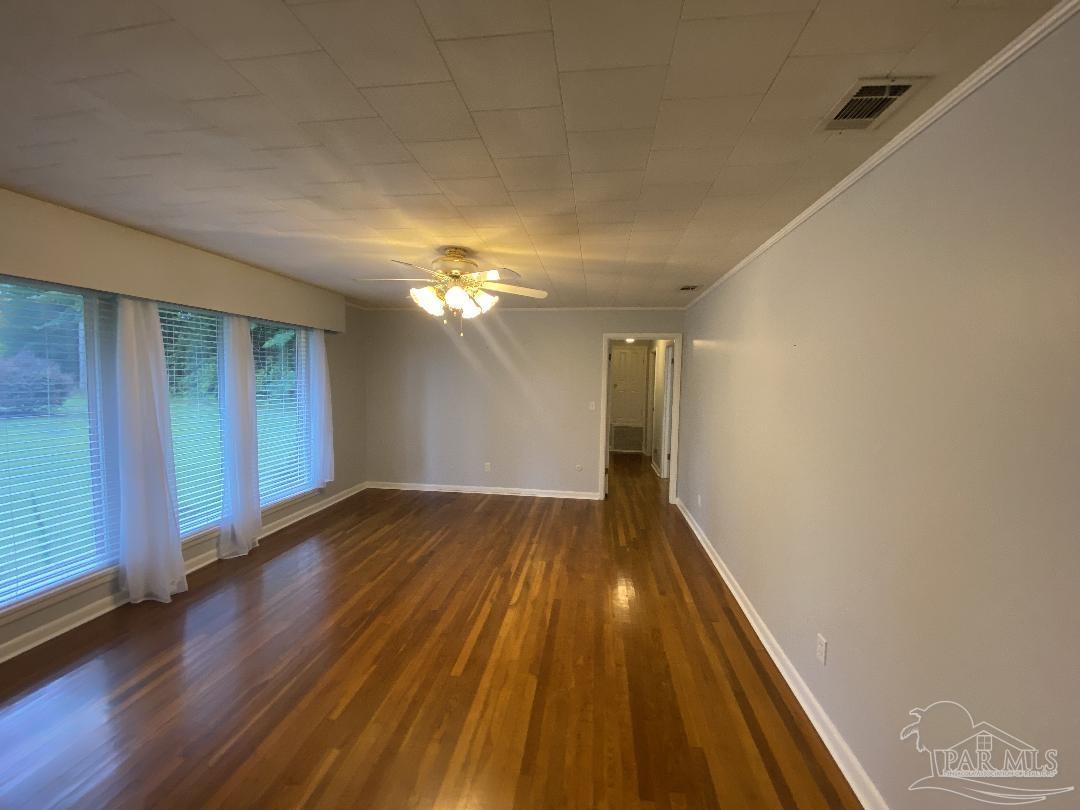 3224 Highway 4 Jay, FL 32565 - Photo 10 of 38 a view of an empty room with wooden floor