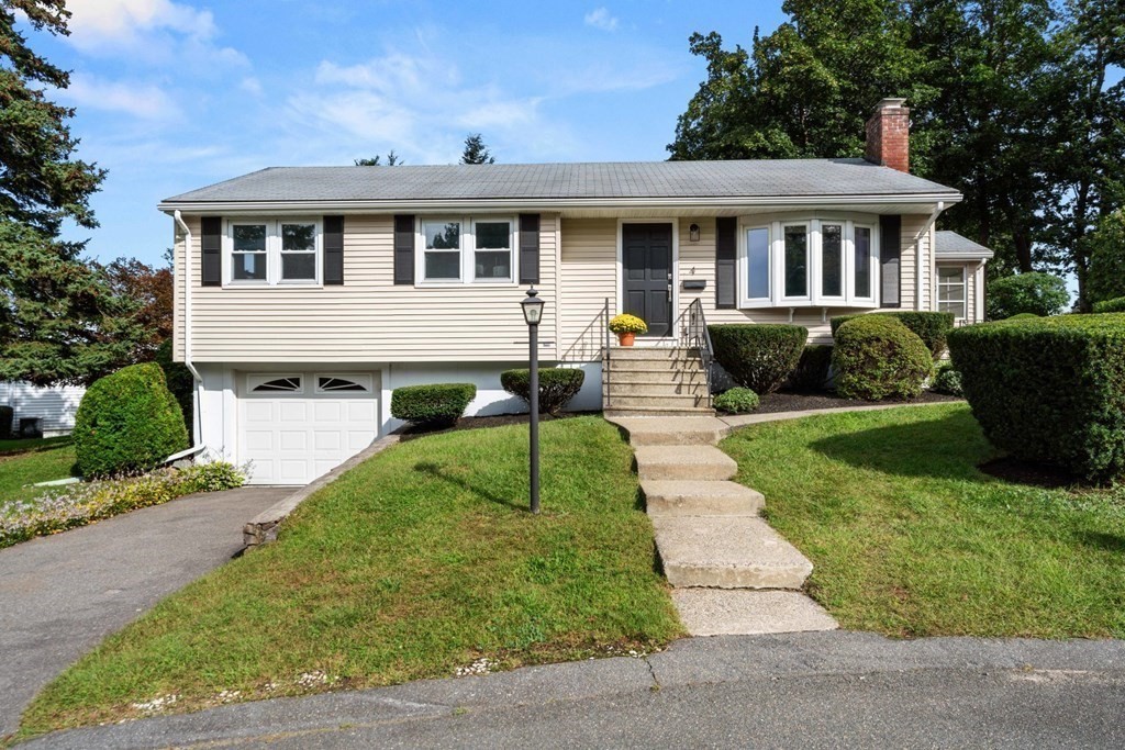 4 Rayner Circle Stoneham, MA 02180 - Photo 2 of 27 a view of outdoor space yard and front view of a house
