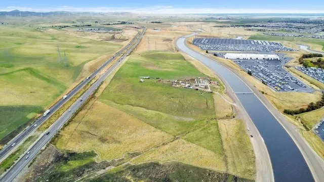 a view of a swimming pool and an ocean view