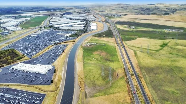 a view of a swimming pool and an outdoor space
