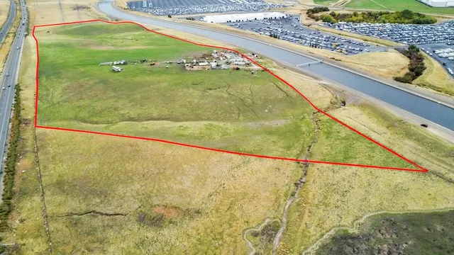 a view of swimming pool with a yard