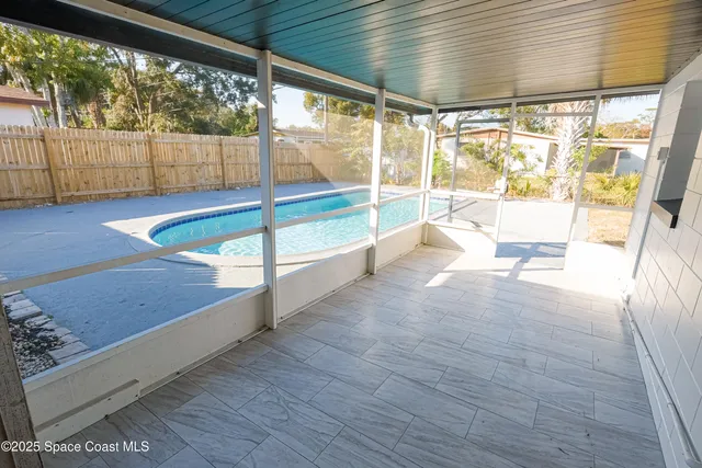 a bathroom with a toilet a sink a mirror and a bathtub