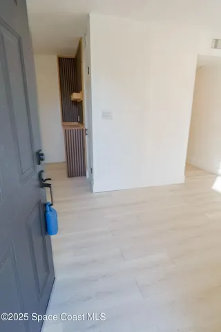 a view of a swimming pool with a table and chairs