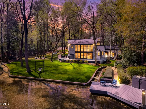 a view of a yard with a tree