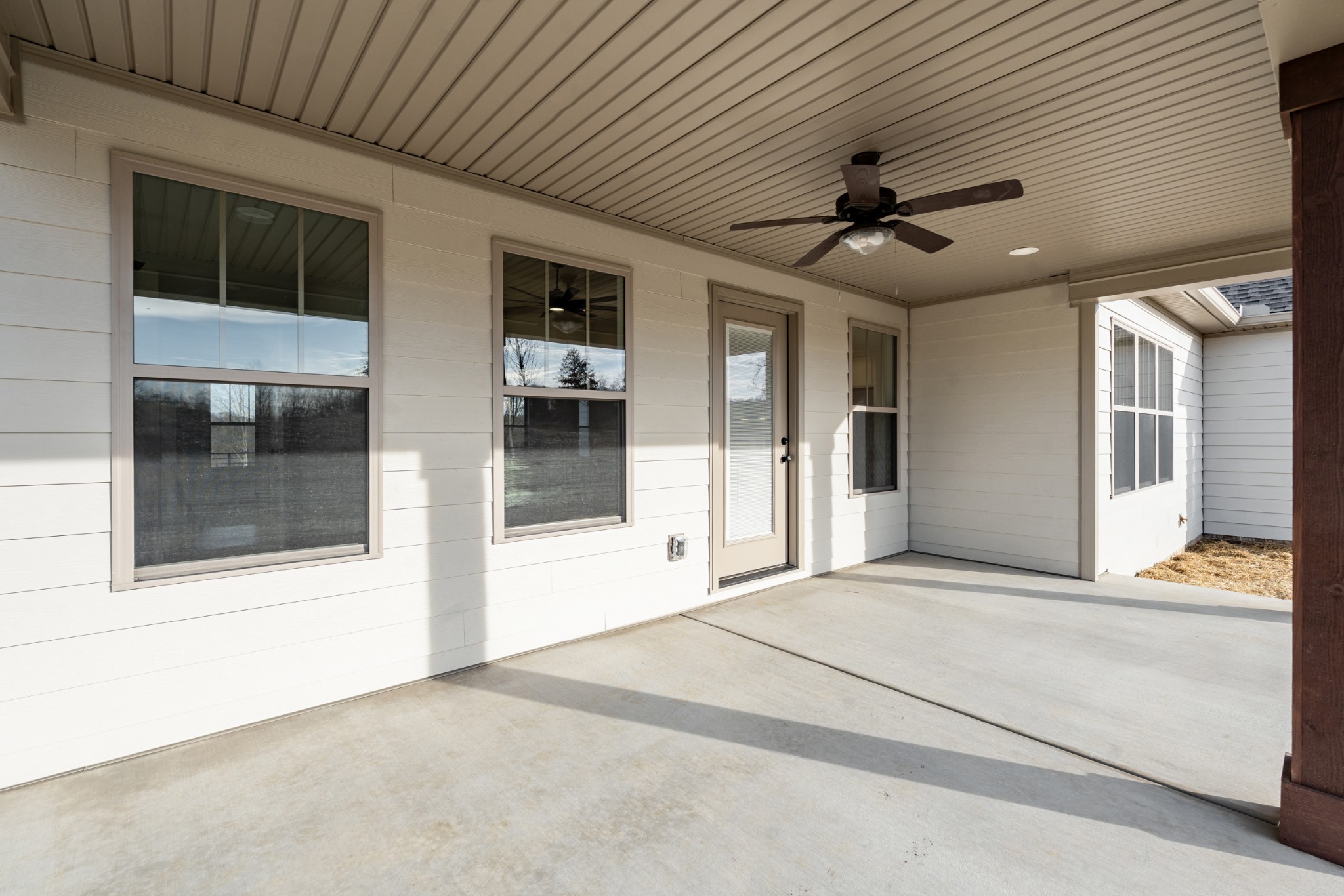 8078 Gideon Road Greenbrier, TN 37073 - Photo 25 of 26 a view of an empty room with a window and kitchen view