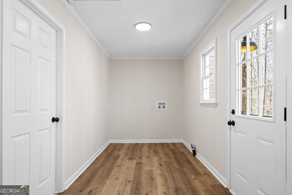 18 Holder Road Temple, GA 30179 - Photo 23 of 44 a view of a hallway with wooden floor and a window