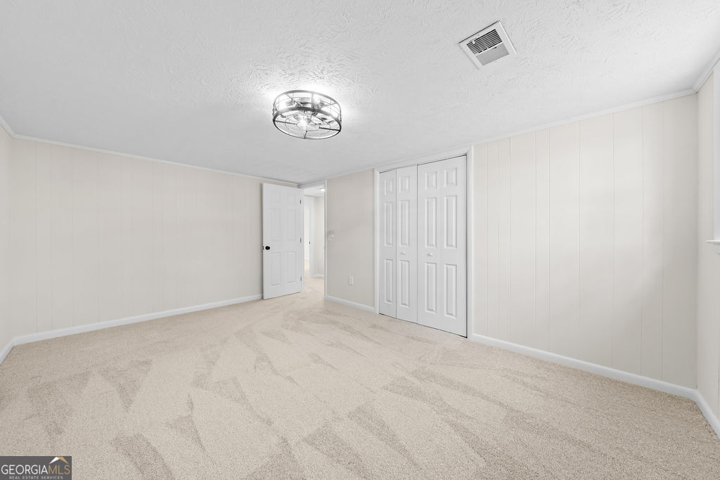 18 Holder Road Temple, GA 30179 - Photo 26 of 44 an empty room with a hallway