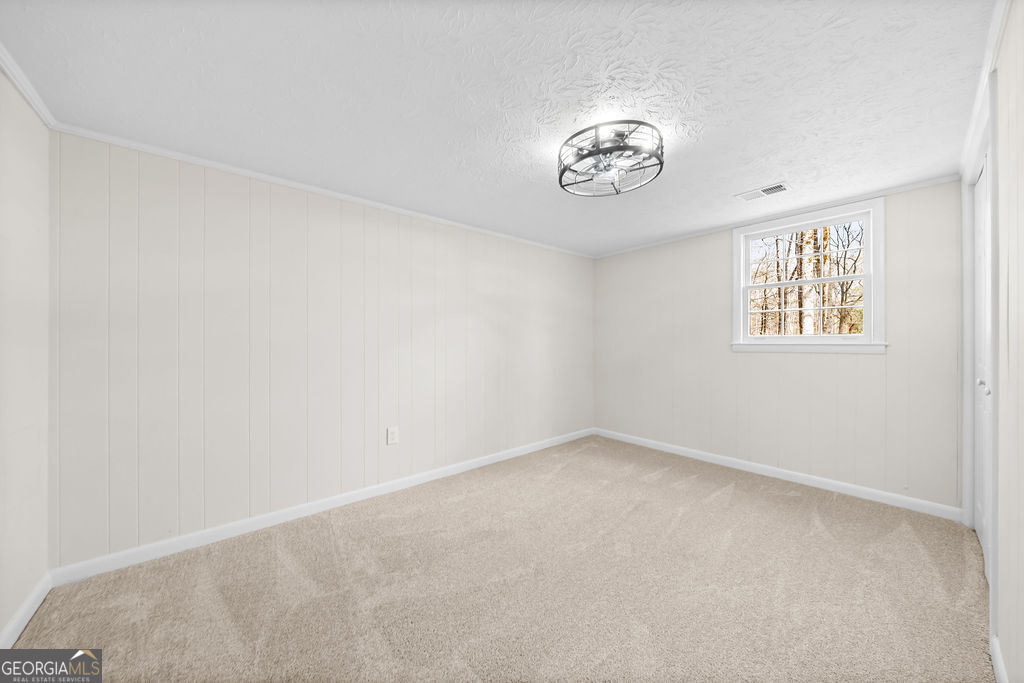18 Holder Road Temple, GA 30179 - Photo 27 of 44 an empty room with a window