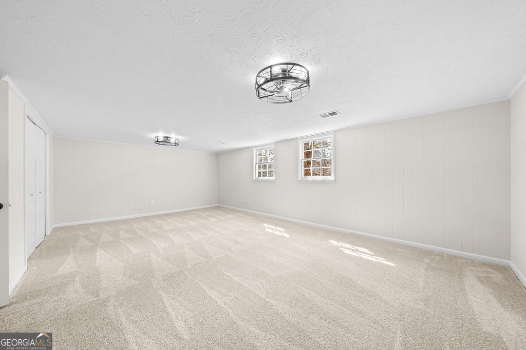 18 Holder Road Temple, GA 30179 - Photo 30 of 44 an empty room with a window