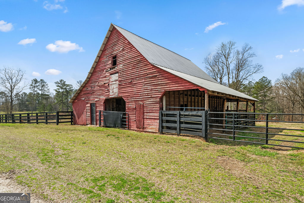 18 Holder Road Temple, GA 30179 - Photo 42 of 44 a front view of house with yard and trees in the background