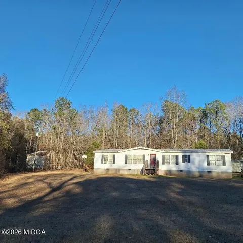 a view of house with ocean view