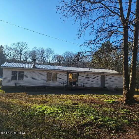 680 Natures Trail Forsyth, GA 31029 - Photo 13 of 14 a view of a house with a yard