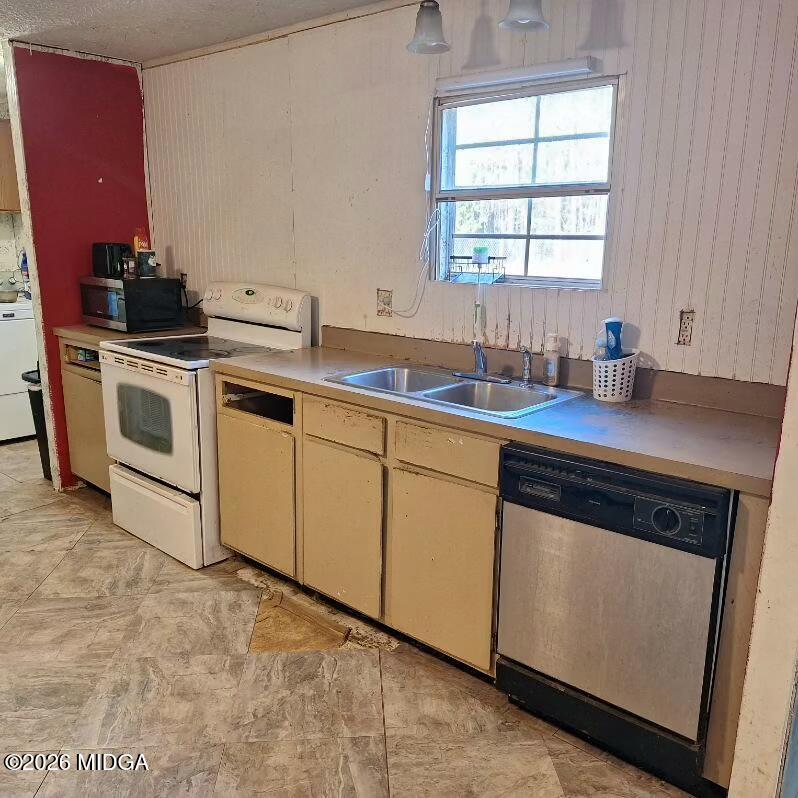 680 Natures Trail Forsyth, GA 31029 - Photo 4 of 14 a kitchen with a sink stove and window