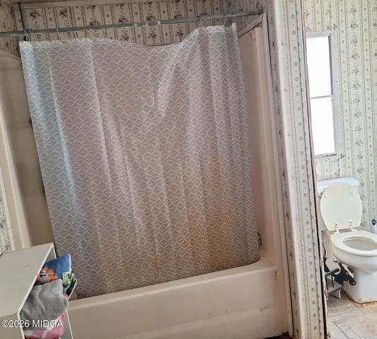 a bathroom with a sink and a bathtub