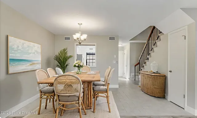 a view of a hallway with staircase