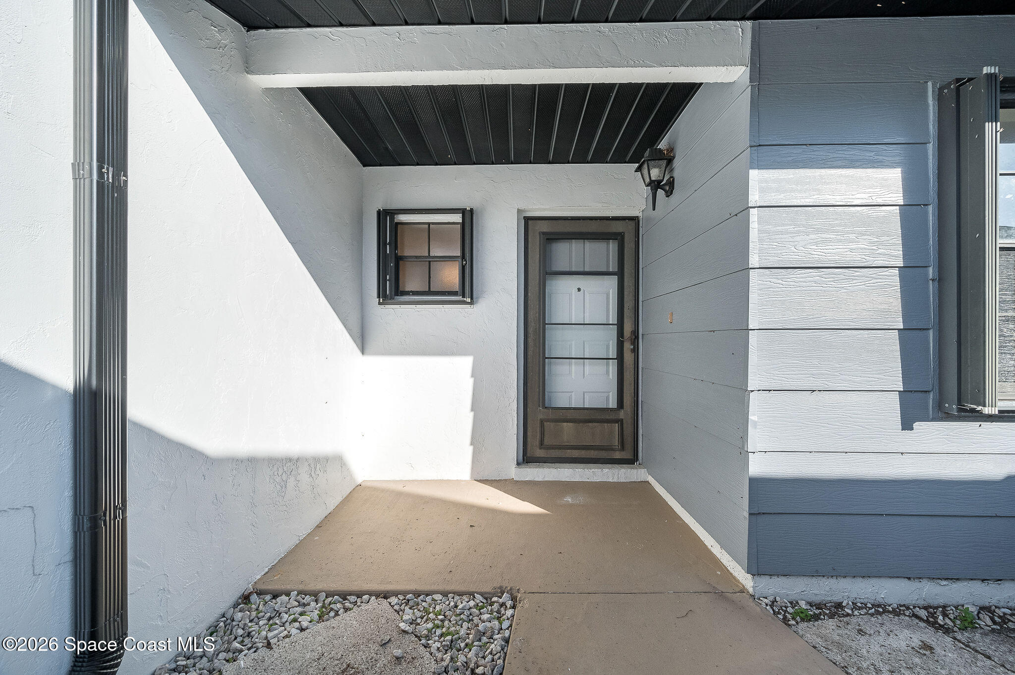 720 Palm Springs Circle Indian Harbour Beach, FL 32937 - Photo 3 of 57 a view of entryway
