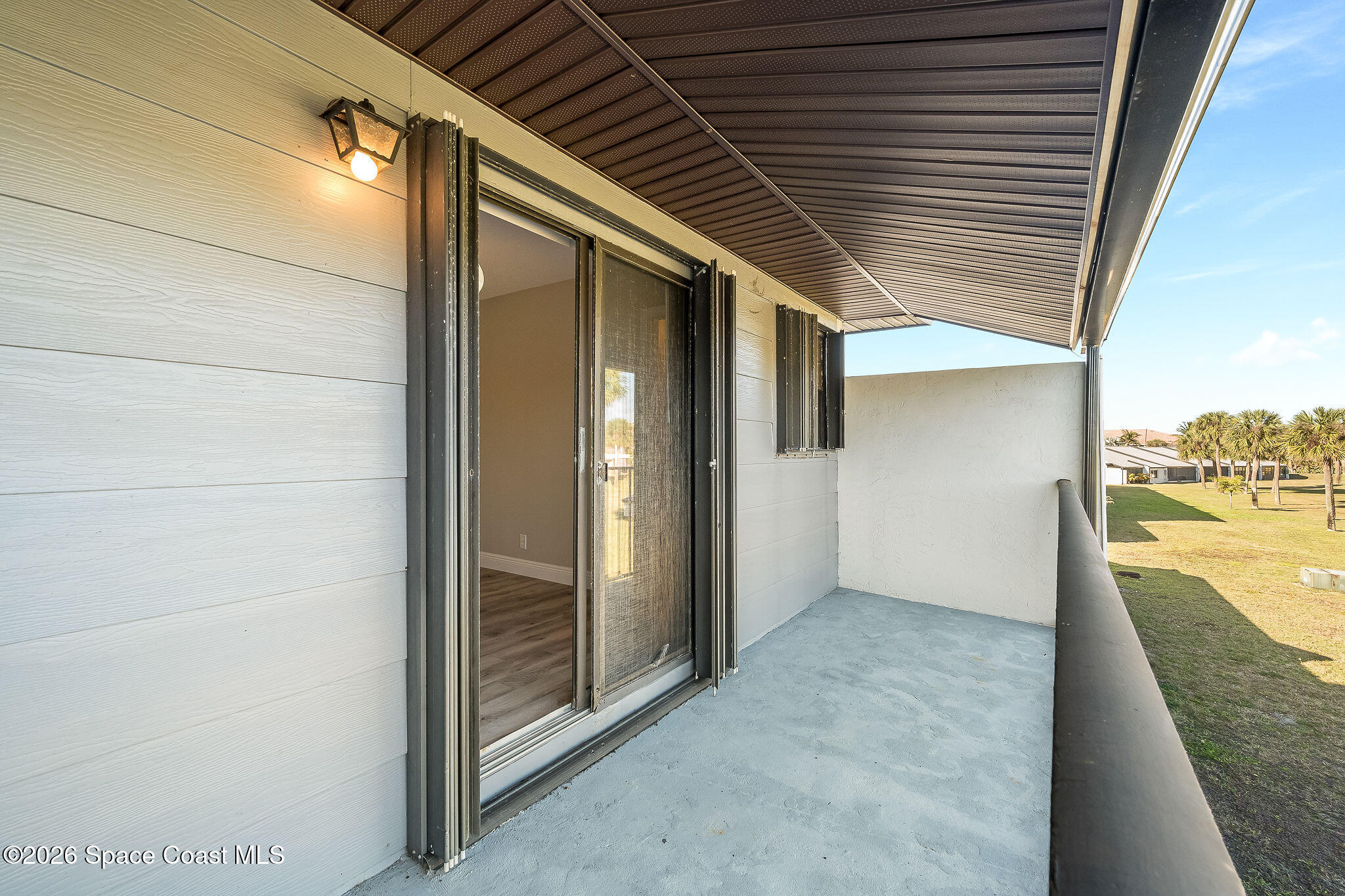 720 Palm Springs Circle Indian Harbour Beach, FL 32937 - Photo 39 of 57 Balcony