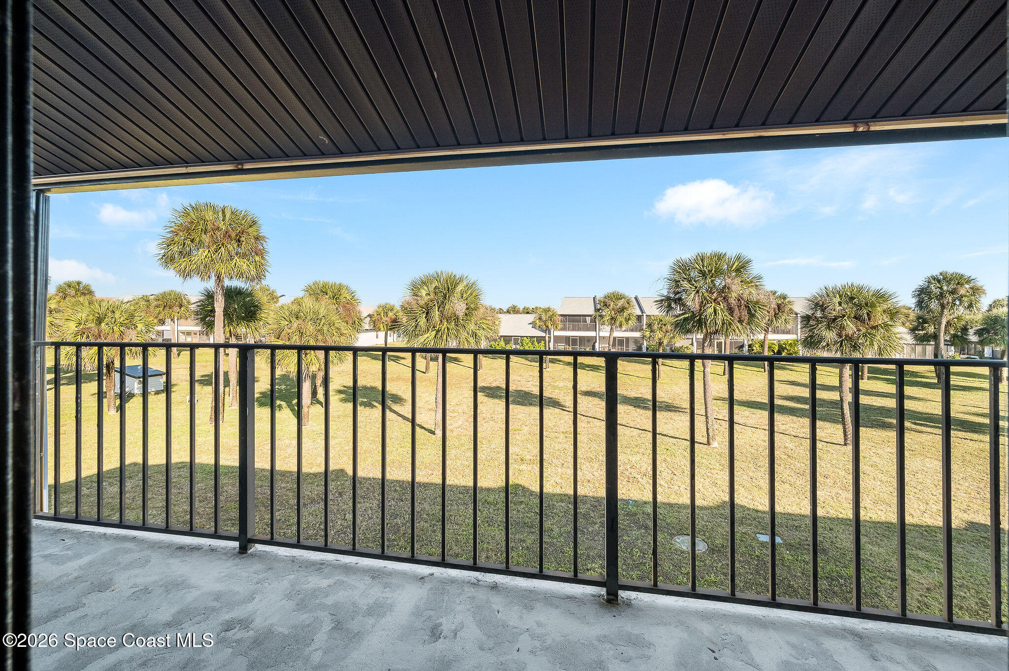 720 Palm Springs Circle Indian Harbour Beach, FL 32937 - Photo 41 of 57 a view of a balcony