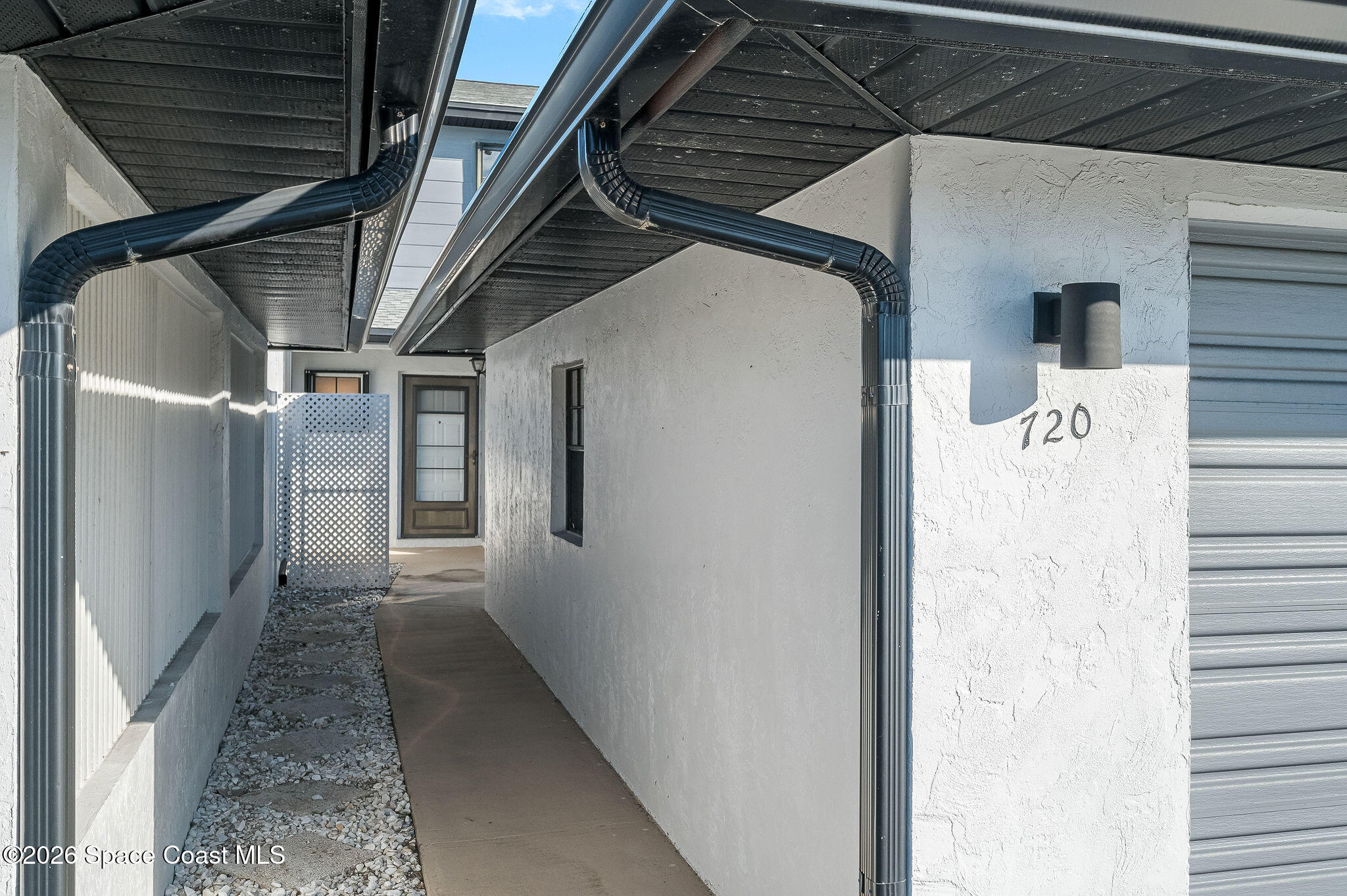 720 Palm Springs Circle Indian Harbour Beach, FL 32937 - Photo 48 of 57 a view of storage and utility room