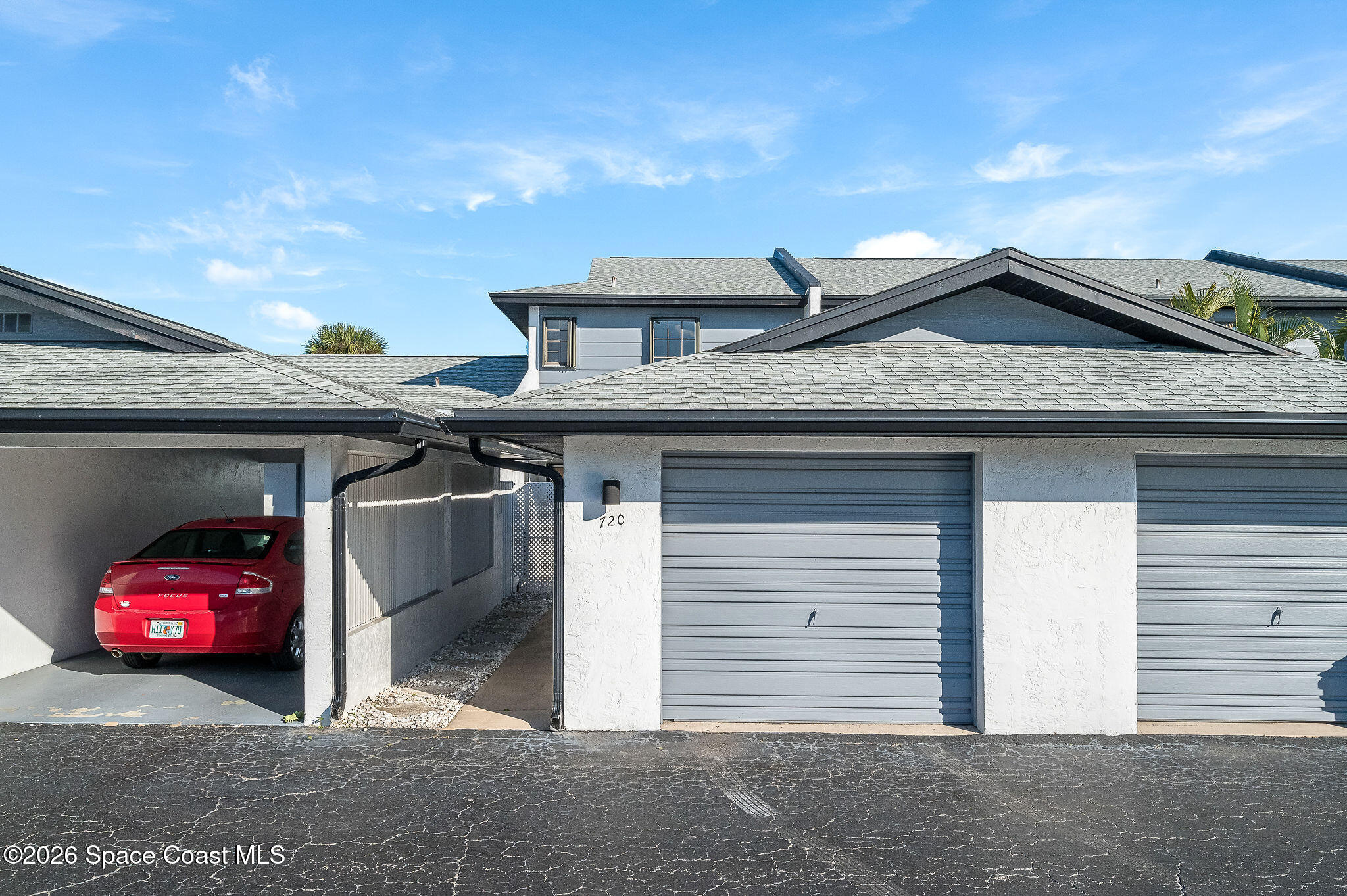 720 Palm Springs Circle Indian Harbour Beach, FL 32937 - Photo 50 of 57 a view of a car garage