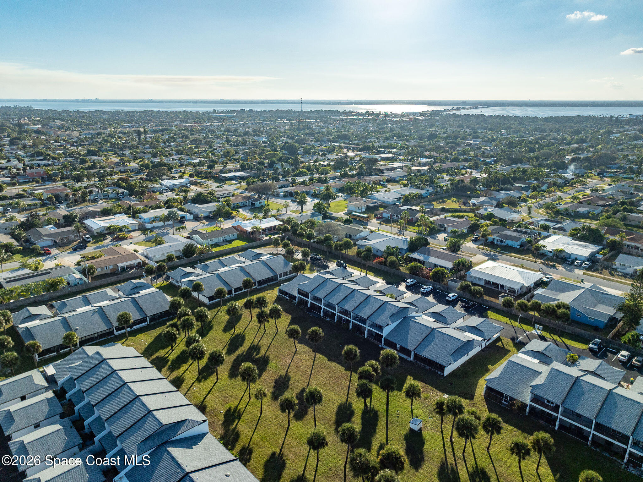 720 Palm Springs Circle Indian Harbour Beach, FL 32937 - Photo 53 of 57 an aerial view of a city