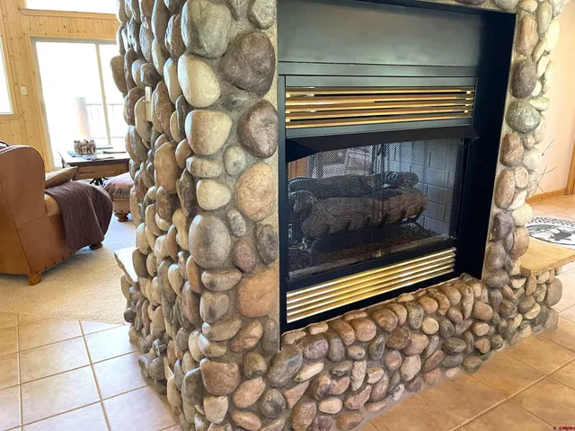a view of a chairs and table in a room