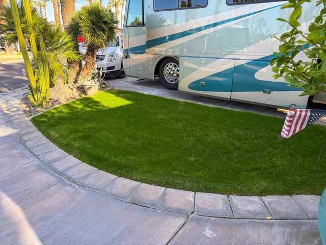 a view of a backyard with sitting area