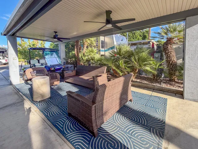 a outdoor living space with furniture and garden view
