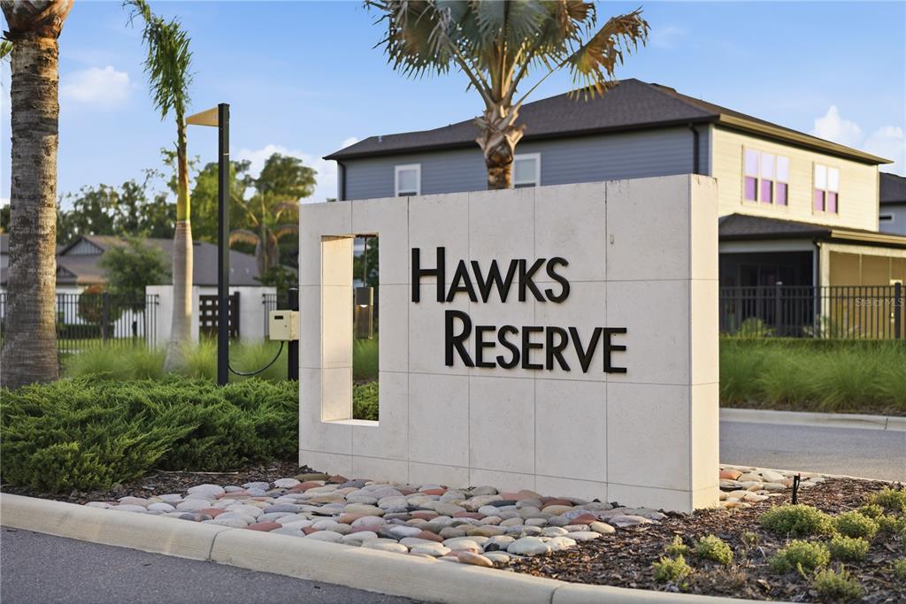 13816 Sharp Hawk Drive Riverview, FL 33569 - Photo 69 of 76 a sign on the side of a building