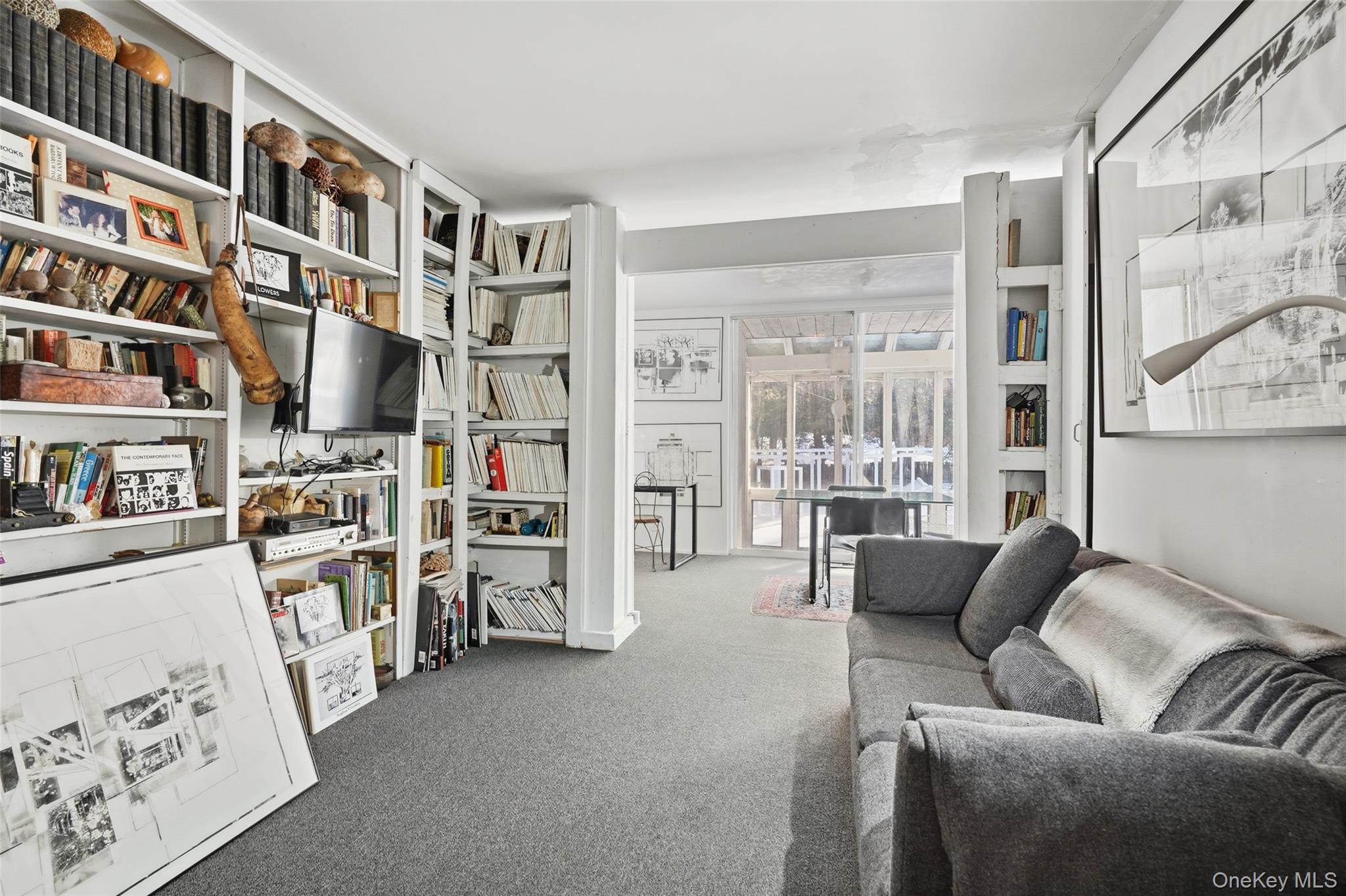 178 Hickory Kingdom Road Bedford, NY 10506 - Photo 12 of 30 a living room with furniture and a book shelf