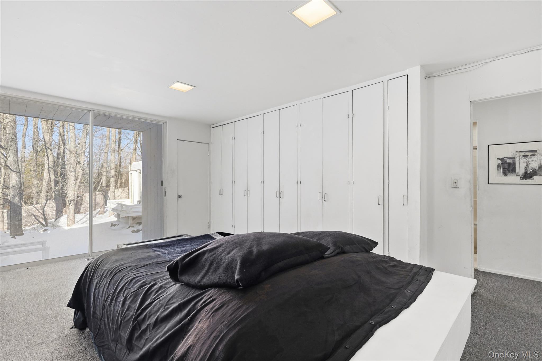 178 Hickory Kingdom Road Bedford, NY 10506 - Photo 20 of 30 a bedroom with a bed and a window