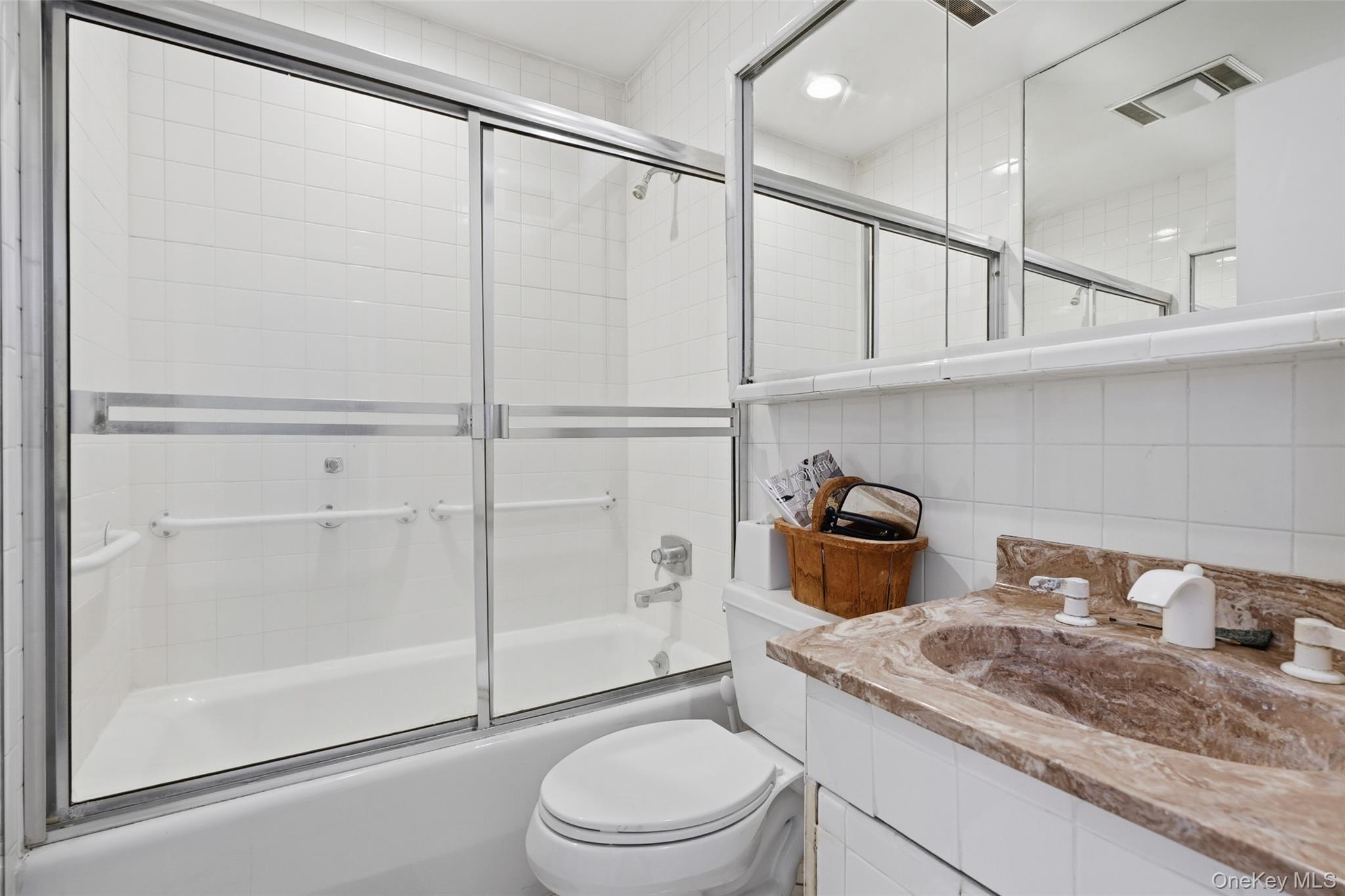 178 Hickory Kingdom Road Bedford, NY 10506 - Photo 22 of 30 a bathroom with a granite countertop sink toilet and shower