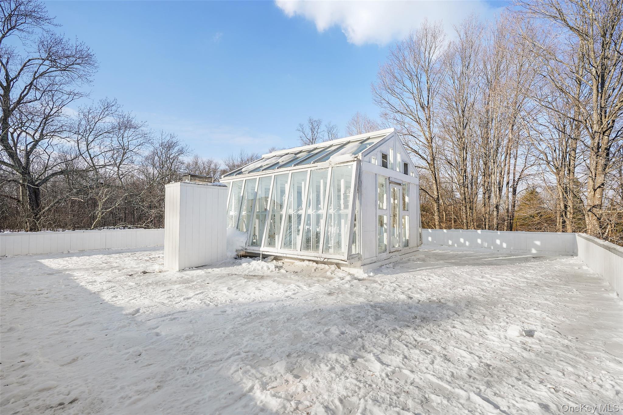 178 Hickory Kingdom Road Bedford, NY 10506 - Photo 25 of 30 a view of a white house with a snow on the road