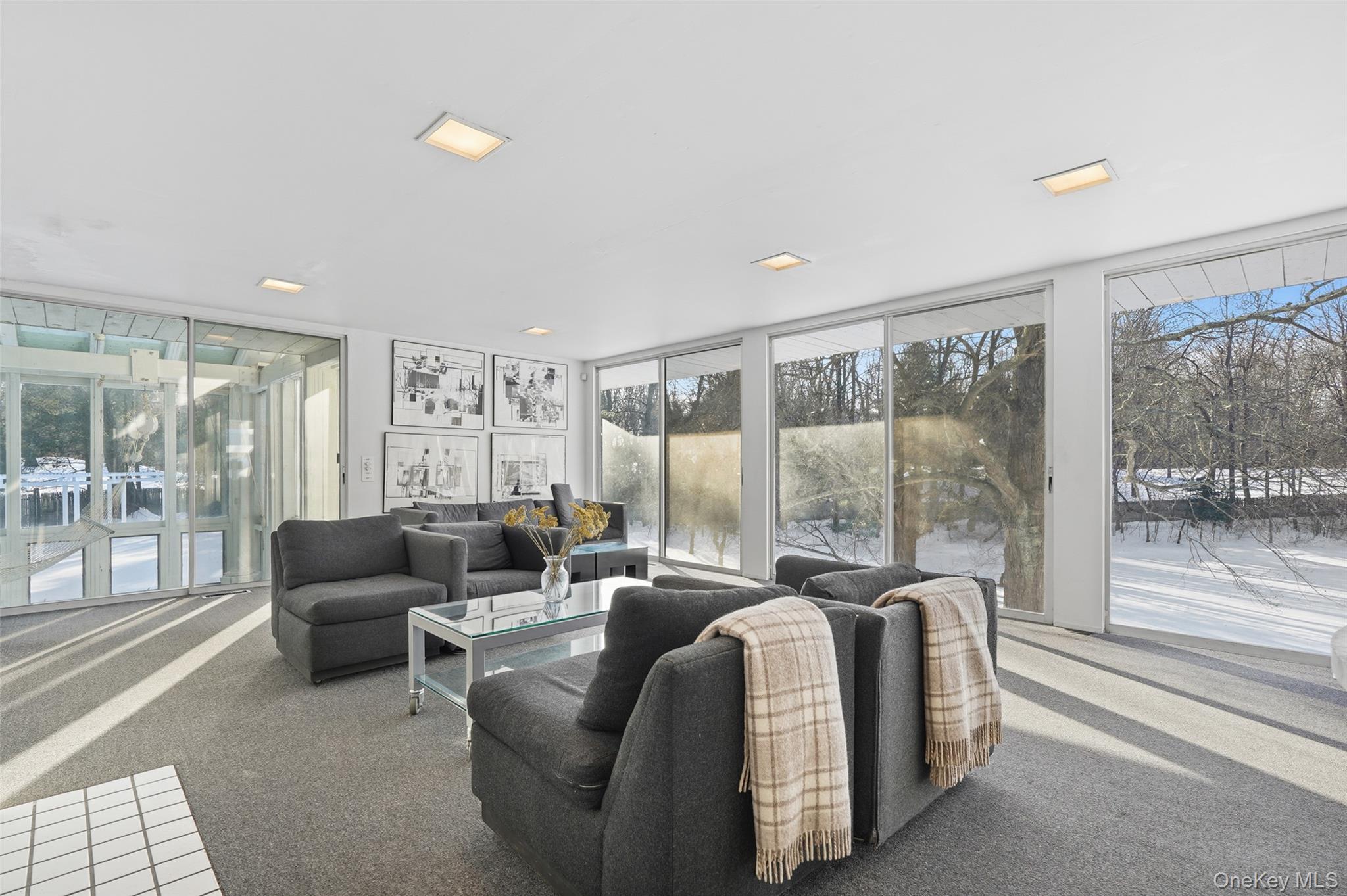 178 Hickory Kingdom Road Bedford, NY 10506 - Photo 7 of 30 a living room with furniture and a floor to ceiling window